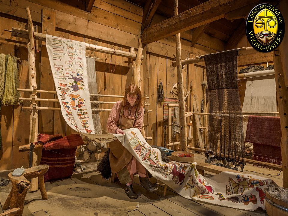 Debs working on embroidered tapestry at Lofotr Viking Museum